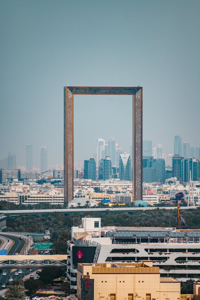 creative-01 The iconic Dubai Frame set against the modern skyline of the city, showcasing unique architecture.